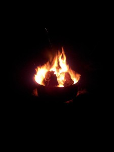 Sitting by Fire Ring at night